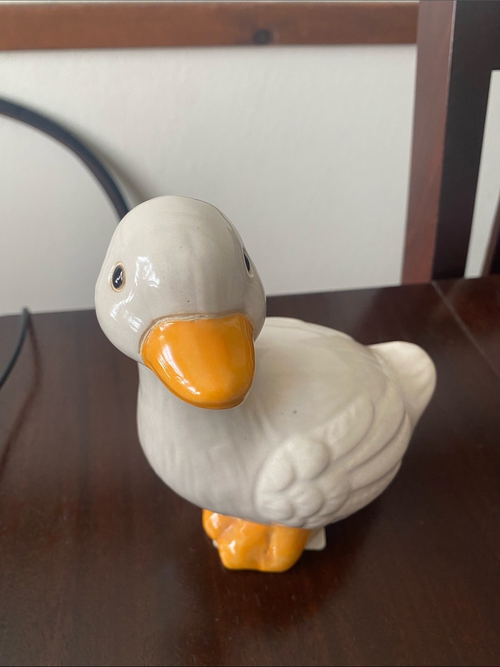 Glossy White Ceramic Duck Figurine with Orange Beak and Feet
